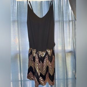 Black romper with sequins